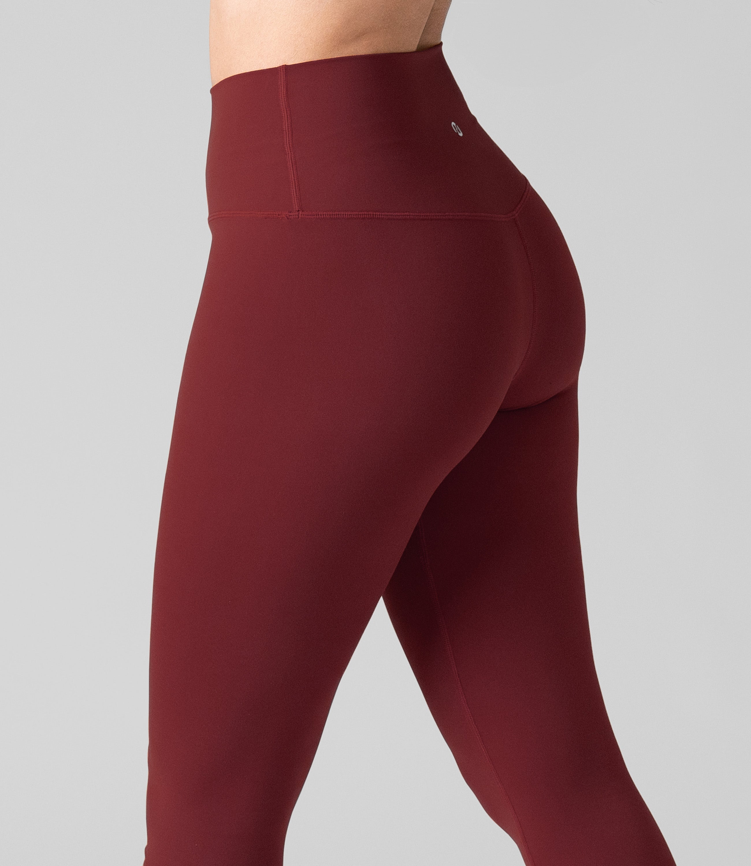 Back view of NirLUX high waist leggings for women in rio red, showing tummy control fit