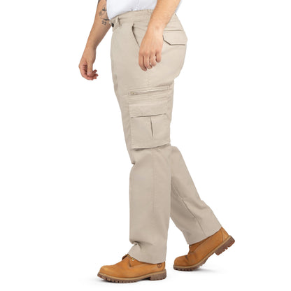 A person walking wearing beige 8-pocket cargo pants with an elastic waist and brown boots.